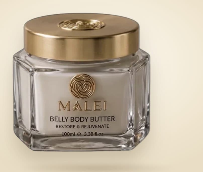 MALEI Belly Body Butter: a faceted glass jar of ivory cream with a brushed-gold cap embossed with the MALEI emblem.